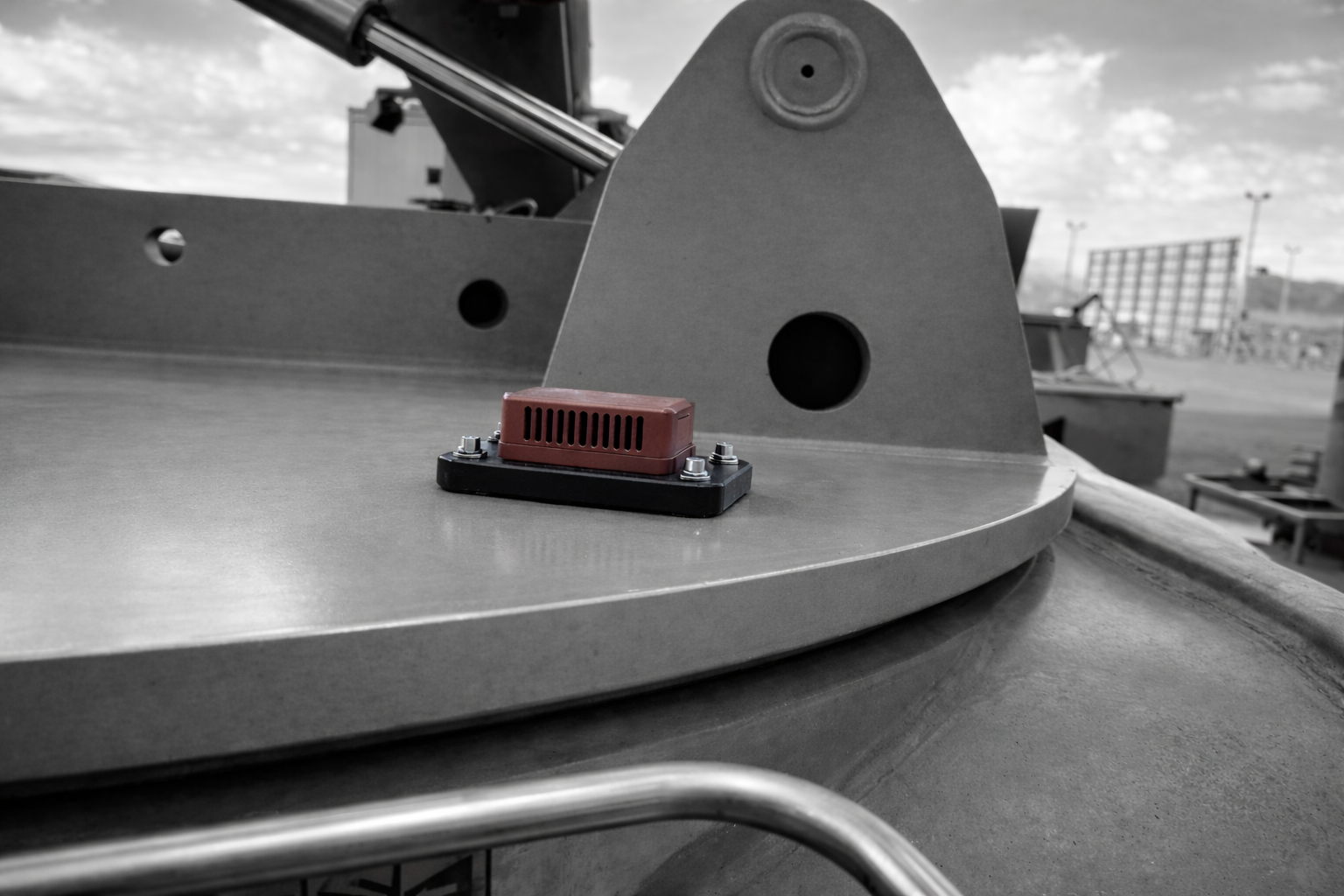 GPM unit installed on grader turntable above the blade